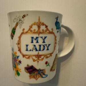 Elegant White Mug with Gold and Blue Accents